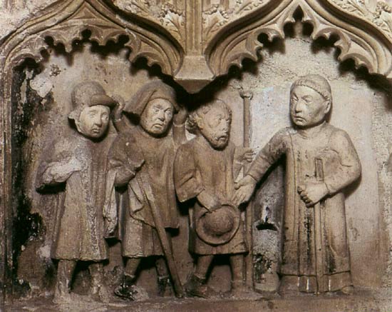 pelgrims bij de kloosterpoort. Burgos, Klooster San Juan de Ortega, detail van een graftombe