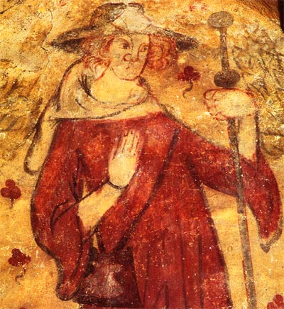 pelgrim met staf en reistas. Fresco, 13de e. Villeneuve-d'Aveyron, H. Grafkapel