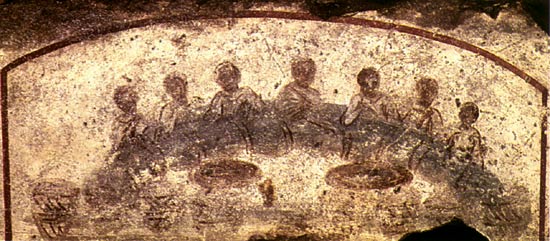 Eucharistieviering (=agap). Fresco, 4de eeuw. Rome, Catacomben van St.-Callixtus.