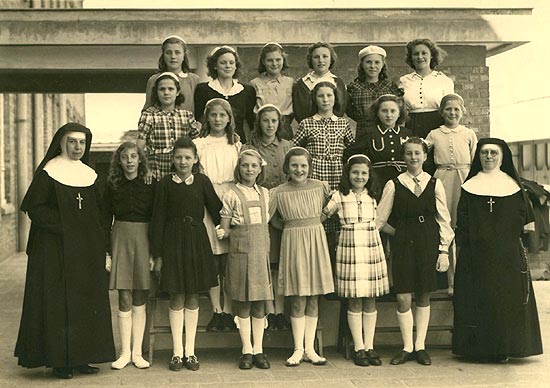 de leerlingen van het 7de leerjaar (1964)