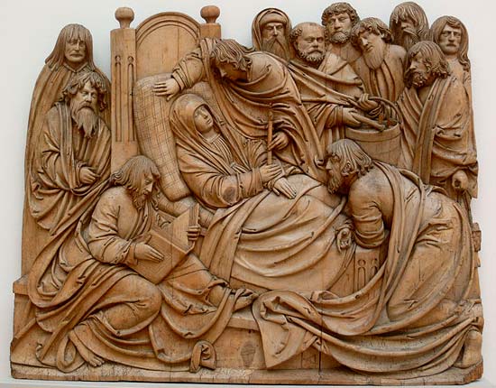 Maria op haar sterfbed, omring door de apostelen. Houtsculptuur. Hans Thoman, 1520. Berlijn, Bode-Museum